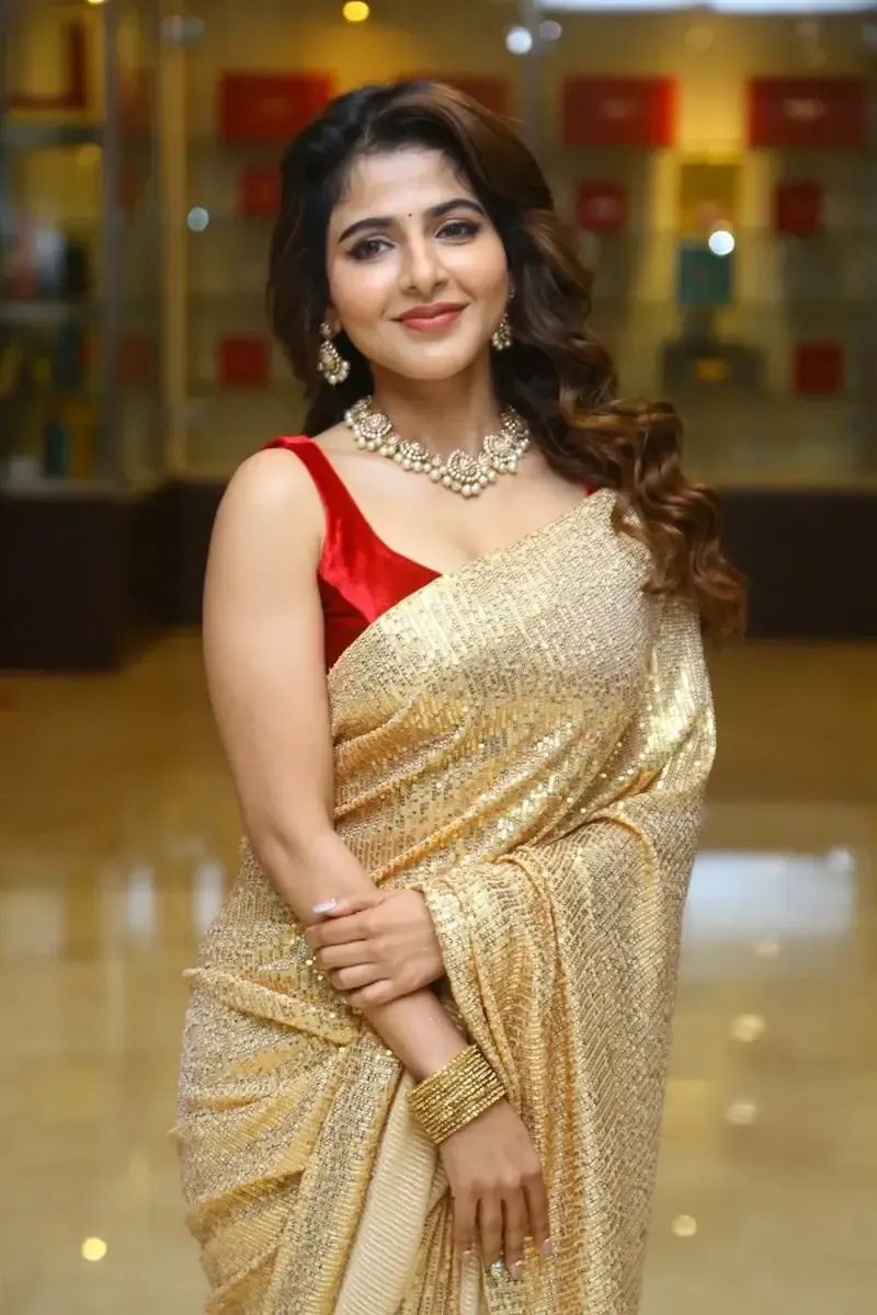 Iswarya Menon in Gold color Saree at Spy Movie Release Event